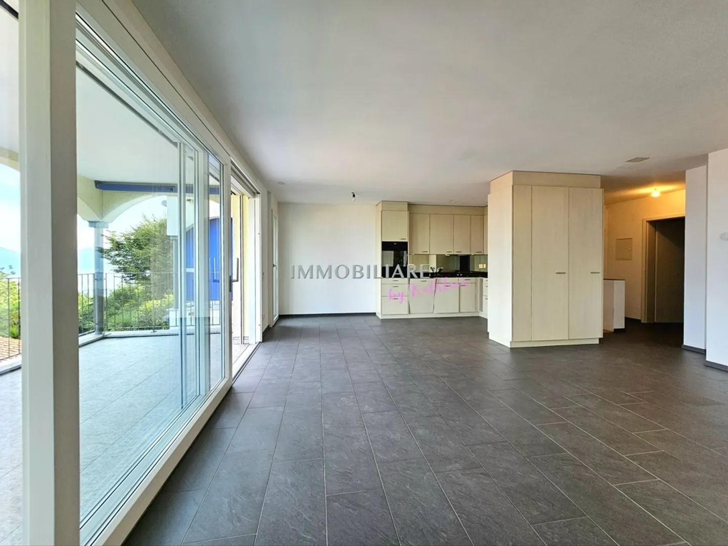 Duplex with 2 large terraces, garden share and partial lake view, primary residence - Photo 6 of 13