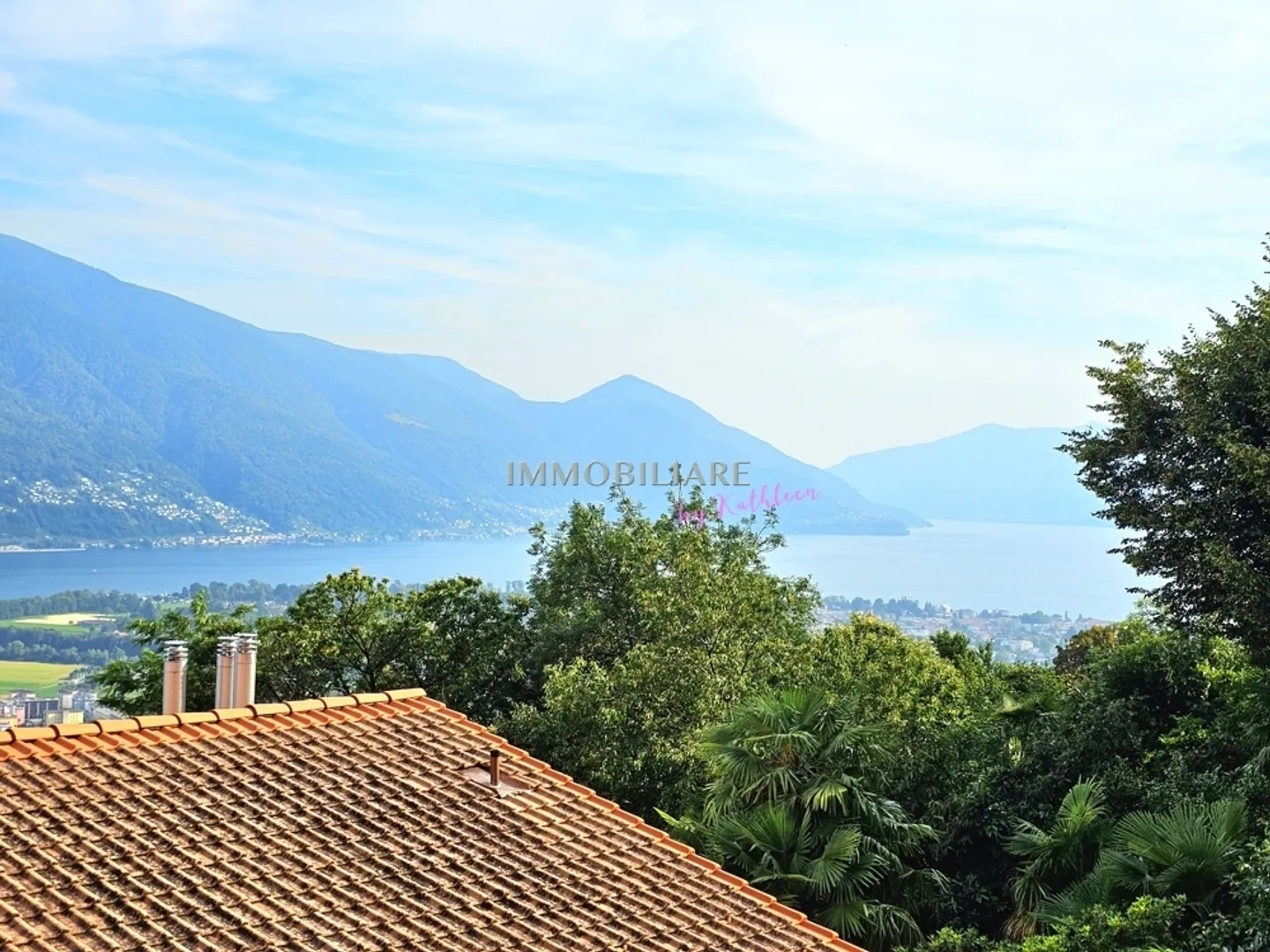 Duplex with 2 large terraces, garden share and partial lake view, primary residence - Photo 8 of 13
