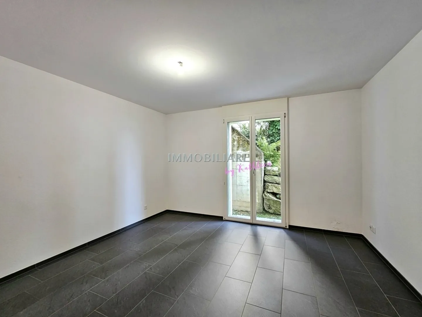 Duplex with 2 large terraces, garden share and partial lake view, primary residence - Photo 9 of 13