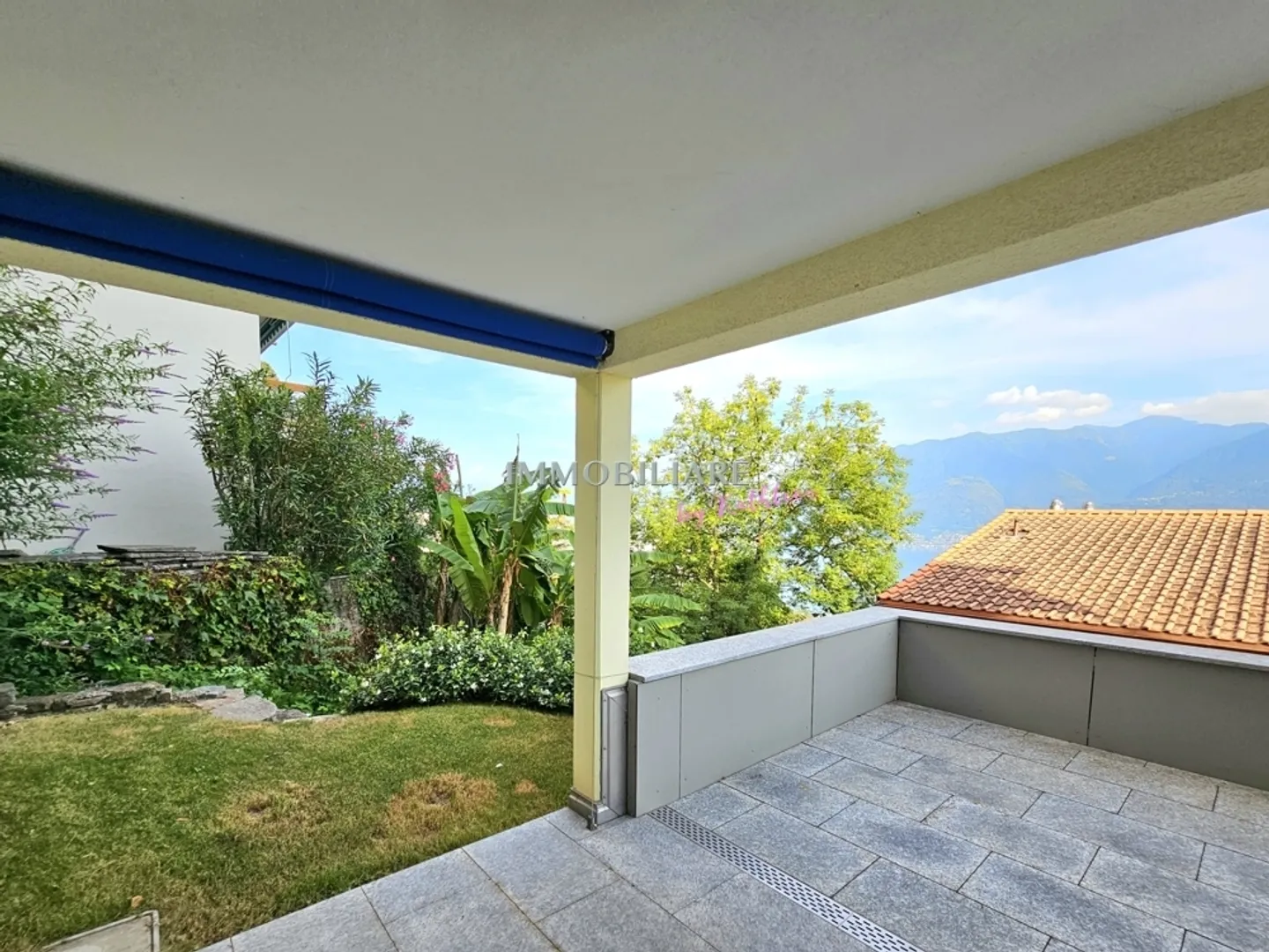 Duplex with 2 large terraces, garden share and partial lake view, primary residence - Photo 11 of 13
