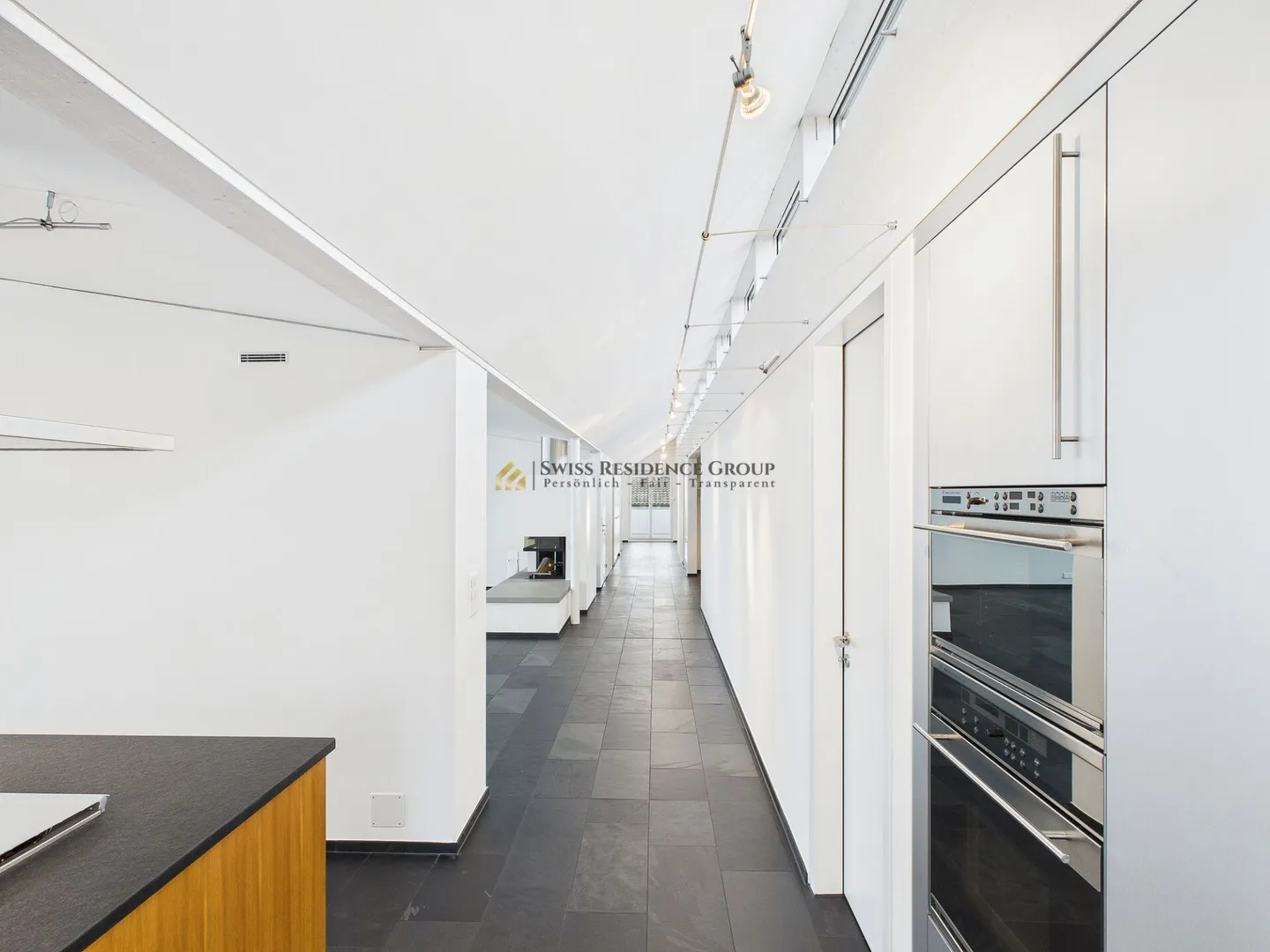 Elegante 5.5-Zimmer-Penthousewohnung mit Liftzugang, Cheminée & grosser Terrasse - Foto 8 von 18