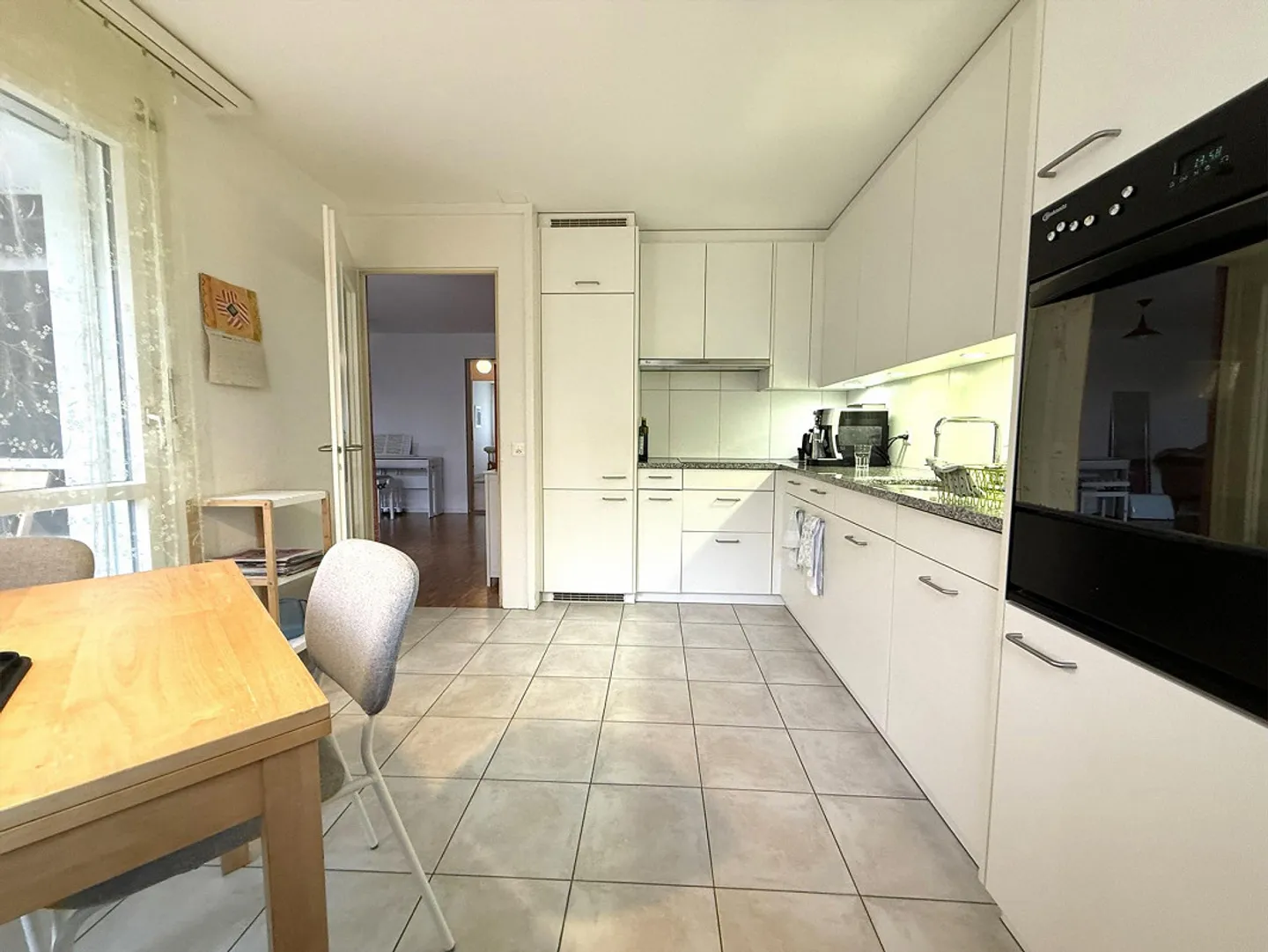 Stylish 3.5-room ground floor apartment in a sought-after location - Photo 7 of 11