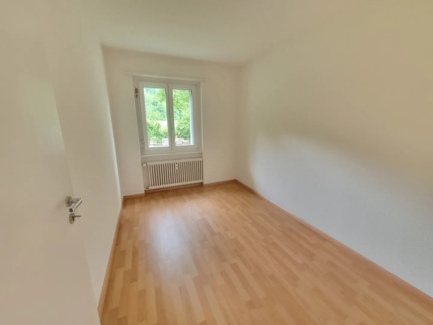 Helle Wohnung mit Grünfläche - Foto 3 von 7