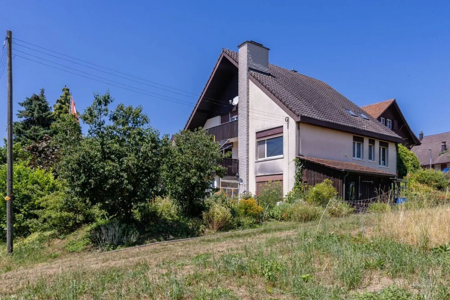 Freistehendes Einfamilienhaus mit Sonnenterrassen und Einliegerwohnung - Foto 5 von 30