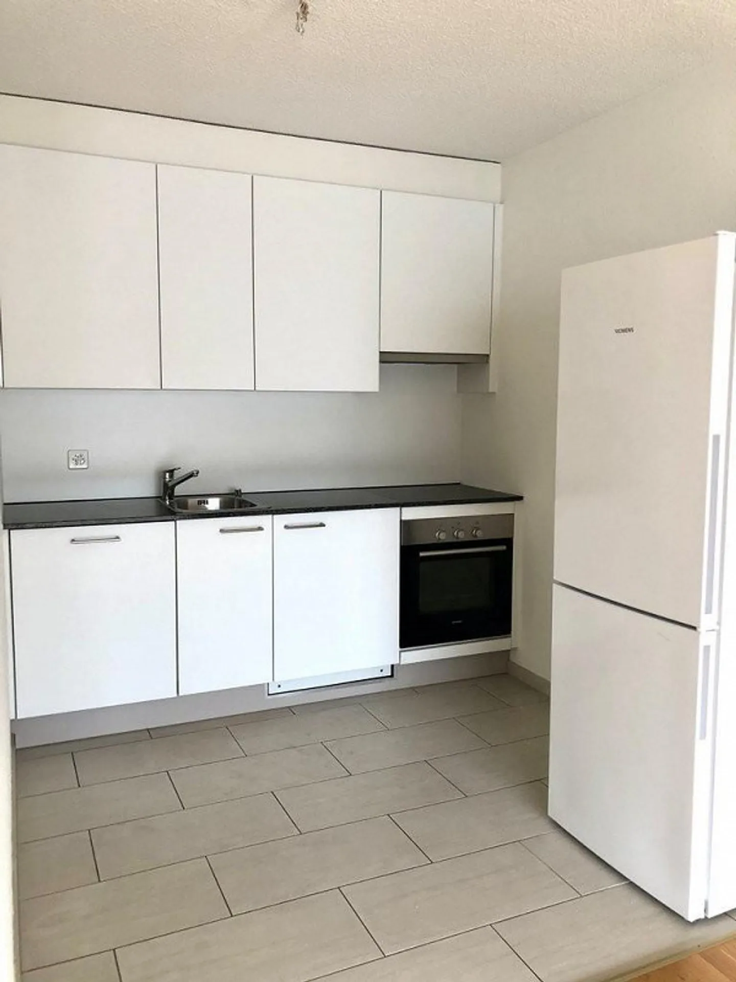 Belle appartement 2 pièces près de la gare SBB - Photo 1 sur 8