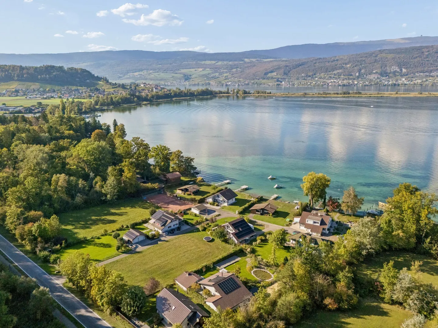 Bauland mit Seezugang - Foto 4 von 12