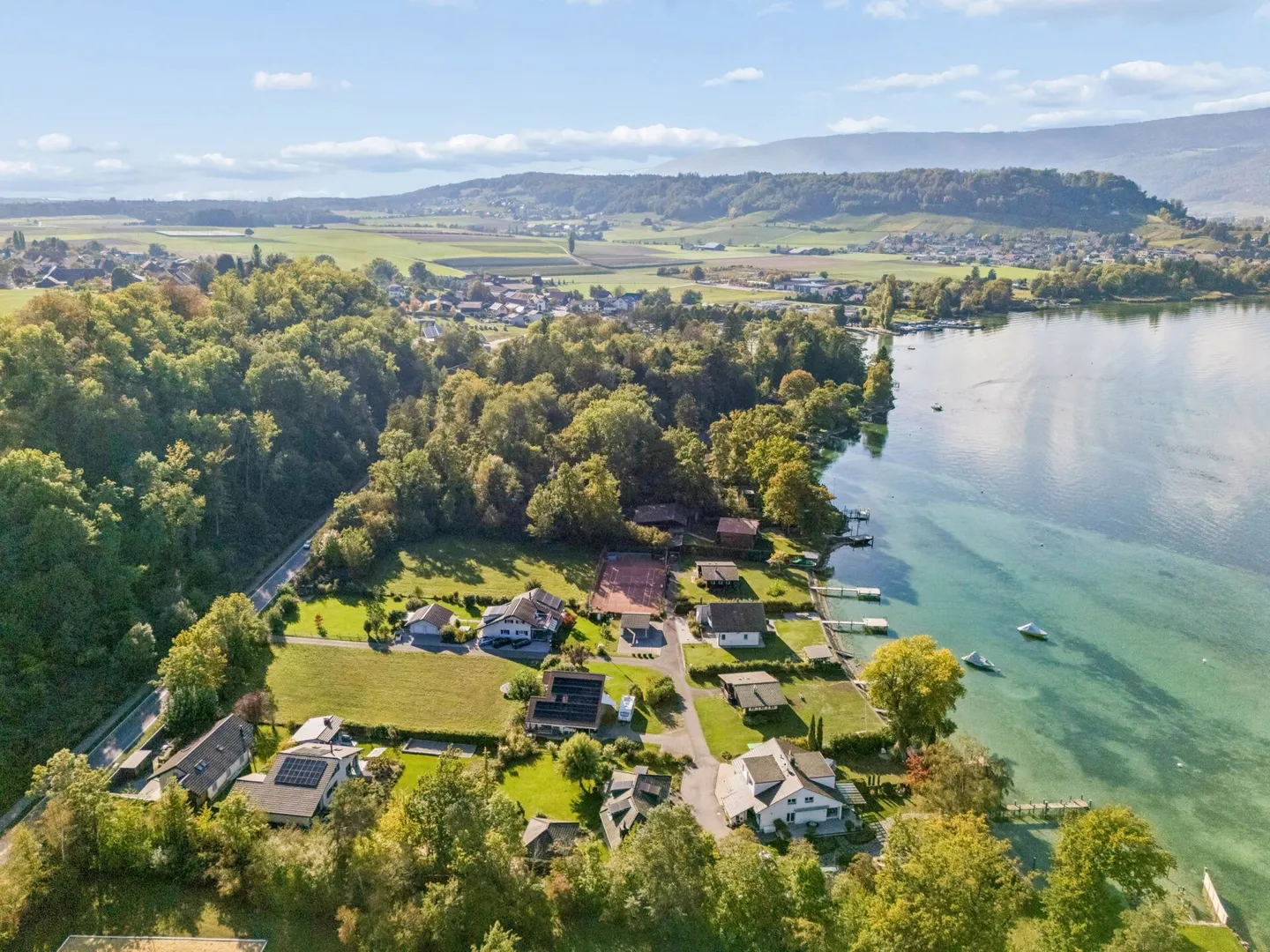 Bauland mit Seezugang - Foto 5 von 12