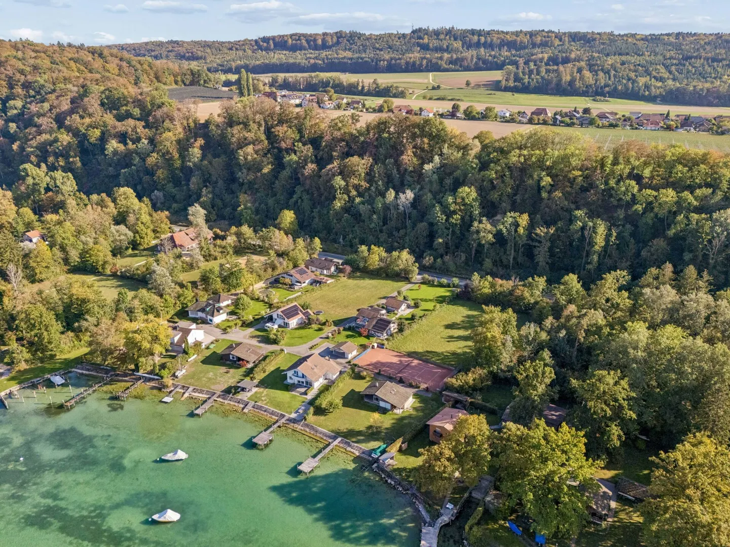 Bauland mit Seezugang - Foto 8 von 12