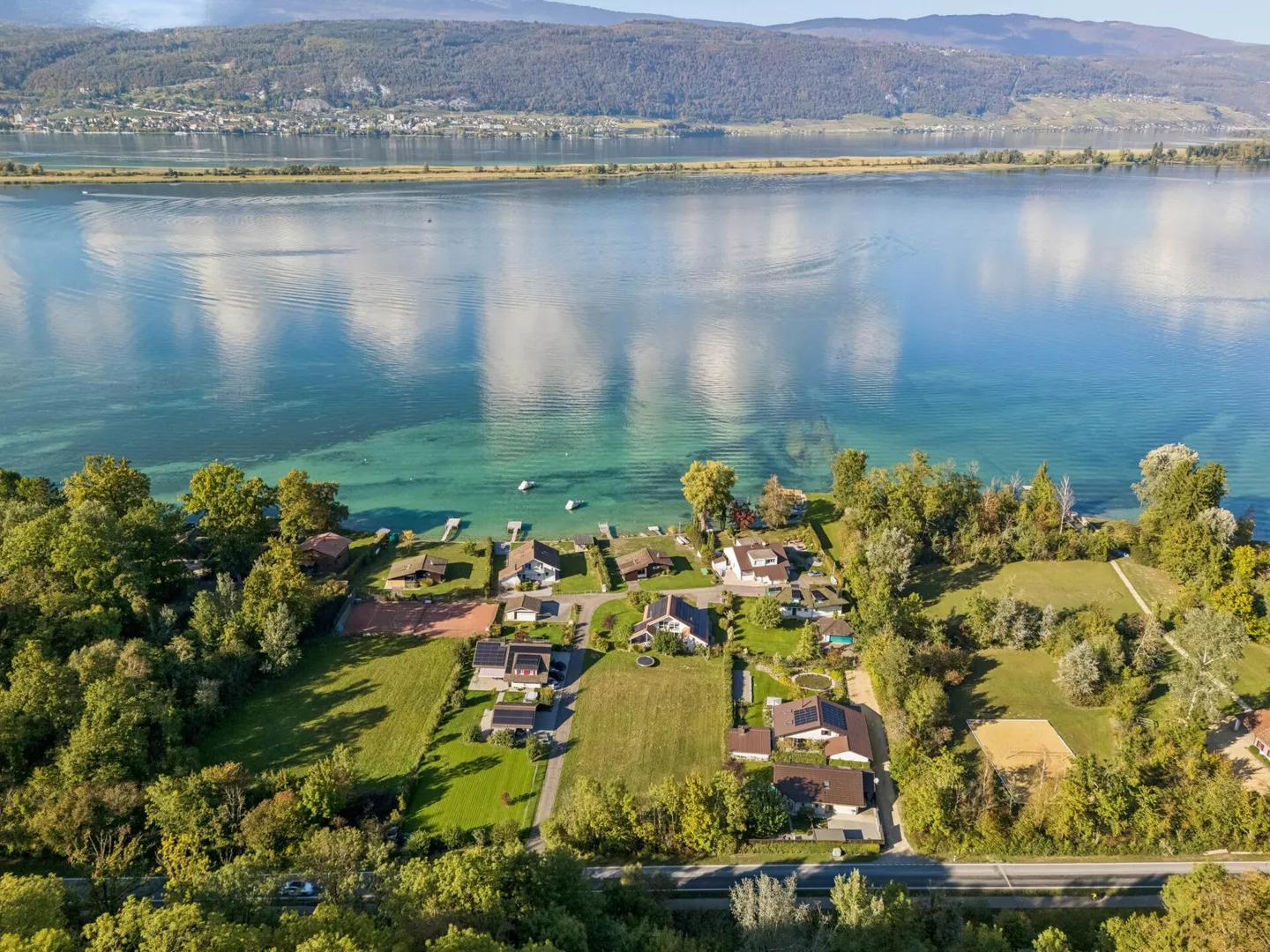 Bauland mit Seezugang - Foto 9 von 12