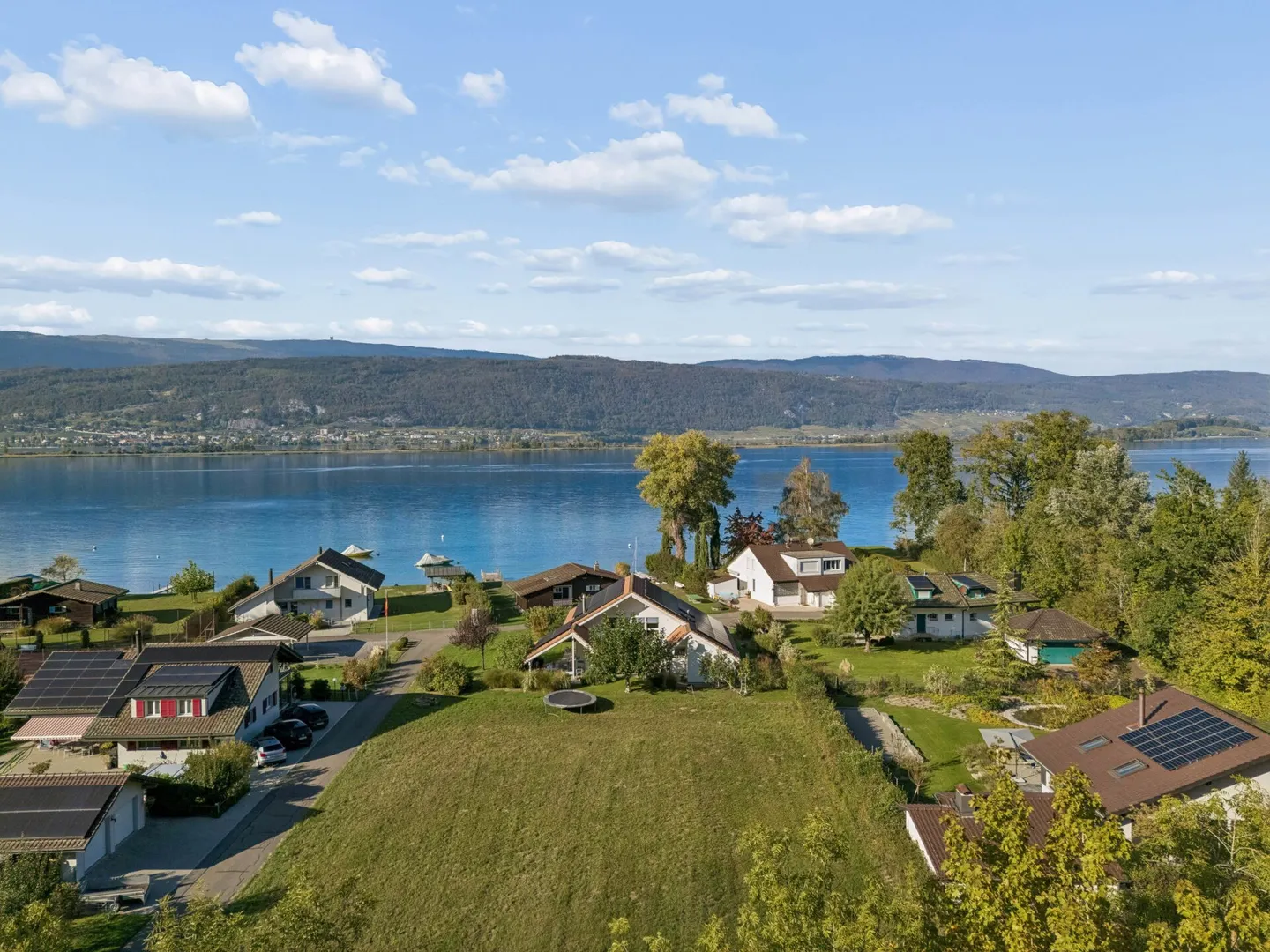 Bauland mit Seezugang - Foto 10 von 12
