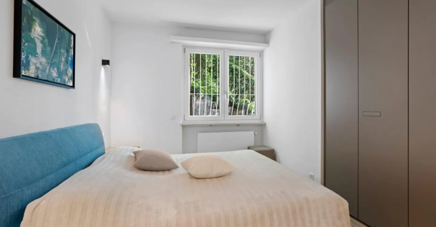 Montagnola – APPARTAMENTO ESCLUSIVO DI 3,5 STANZE IN UNA VILLA CON SOLI 4 UNITA', UN'OASI DI DESIGN NEL VERDE - Foto 9 di 12