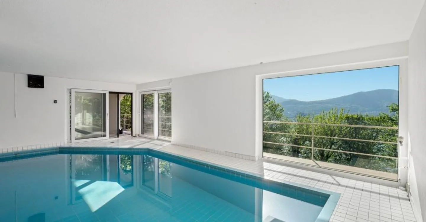 Montagnola – APPARTAMENTO ESCLUSIVO DI 3,5 STANZE IN UNA VILLA CON SOLI 4 UNITA', UN'OASI DI DESIGN NEL VERDE - Foto 12 di 12