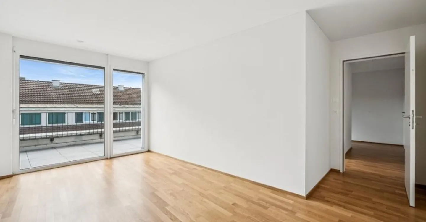 Stilvolle Attikawohnung mit Terrasse - Foto 4 von 10