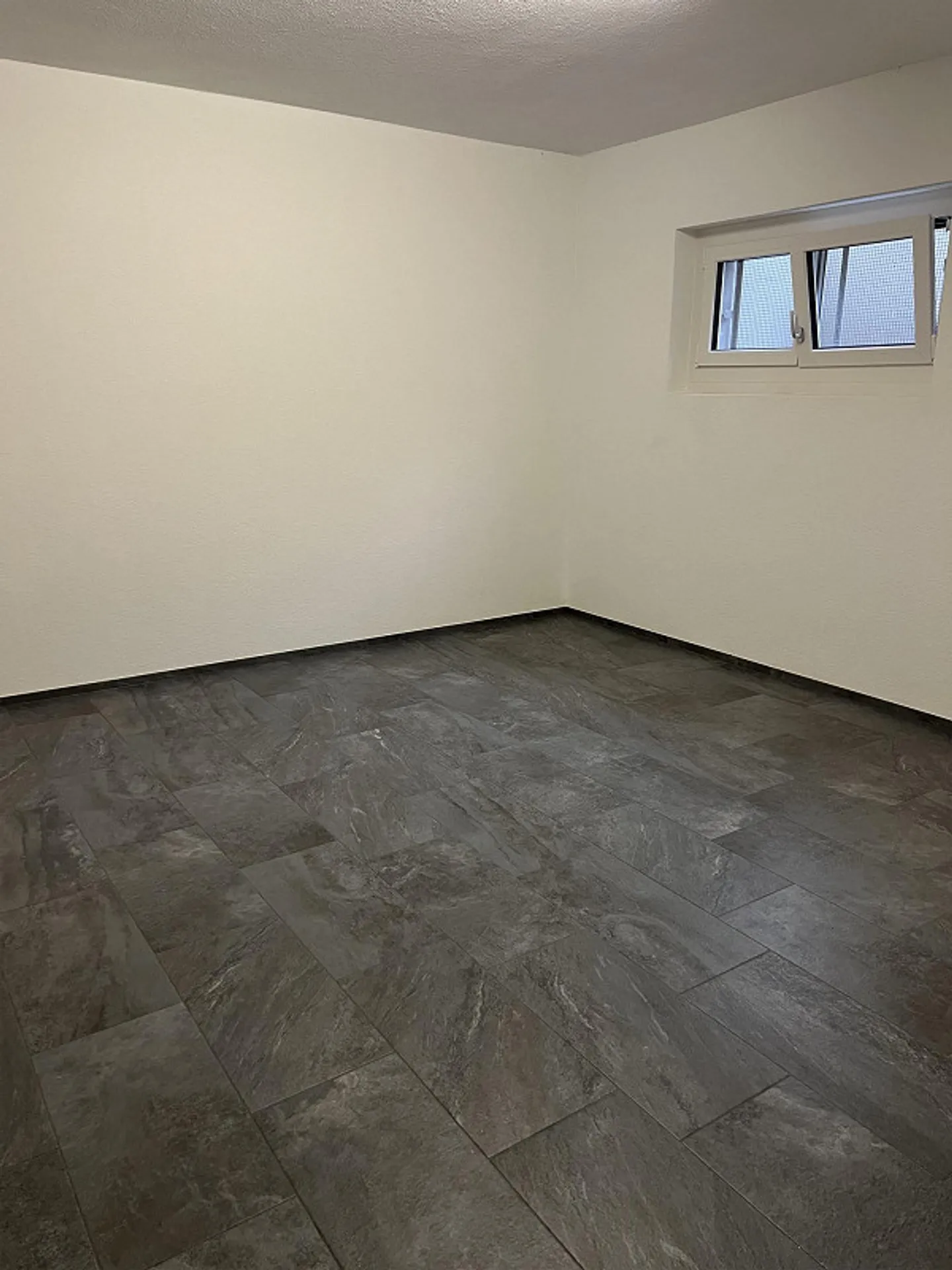 Renovated storage room in a well-maintained multi-family house - Photo 2 of 4