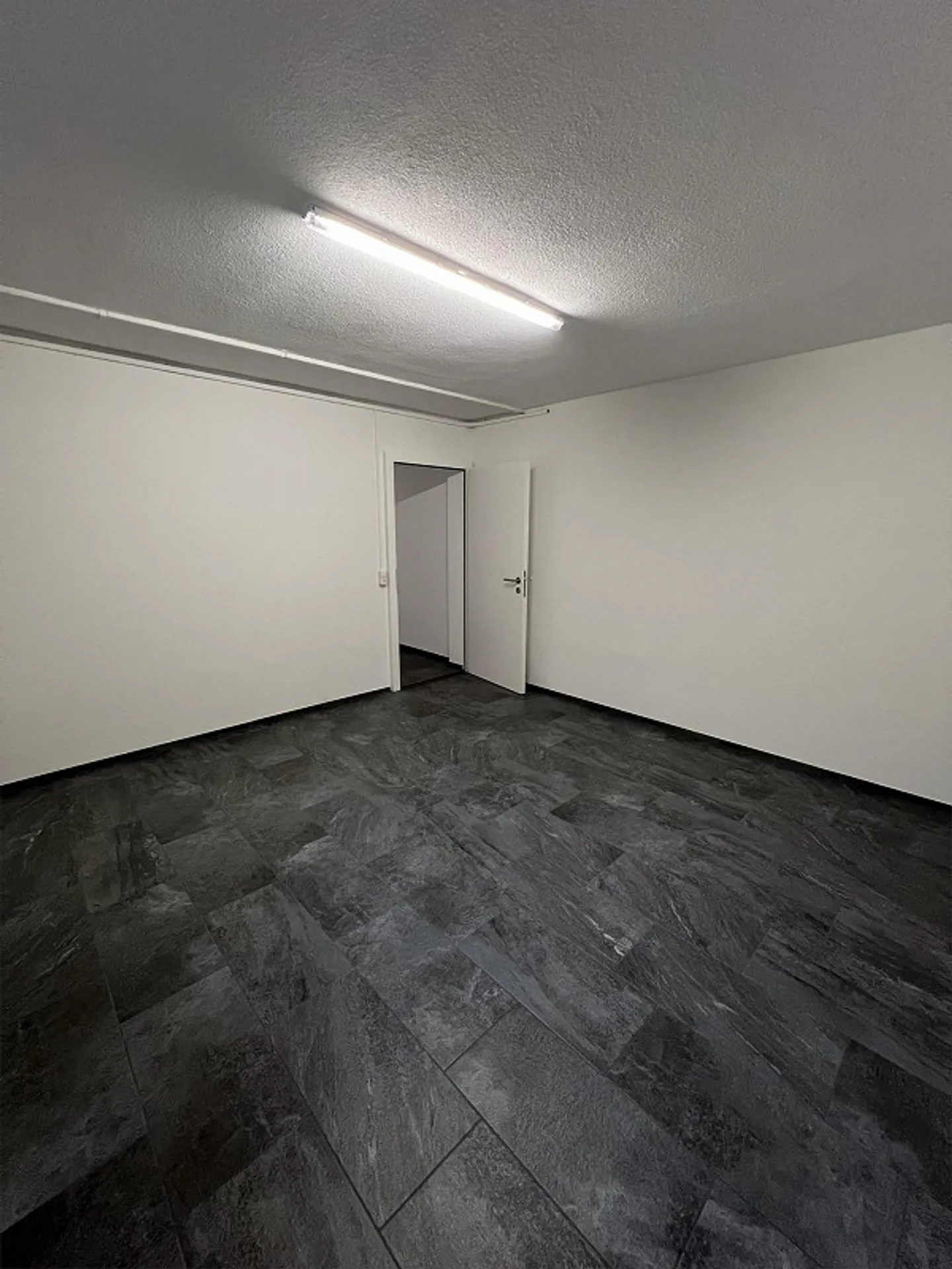 Renovated storage room in a well-maintained multi-family house - Photo 3 of 4