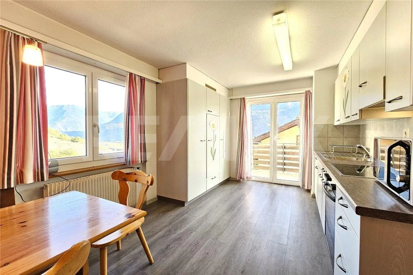 Un appartement familial abordable - Photo 2 sur 13