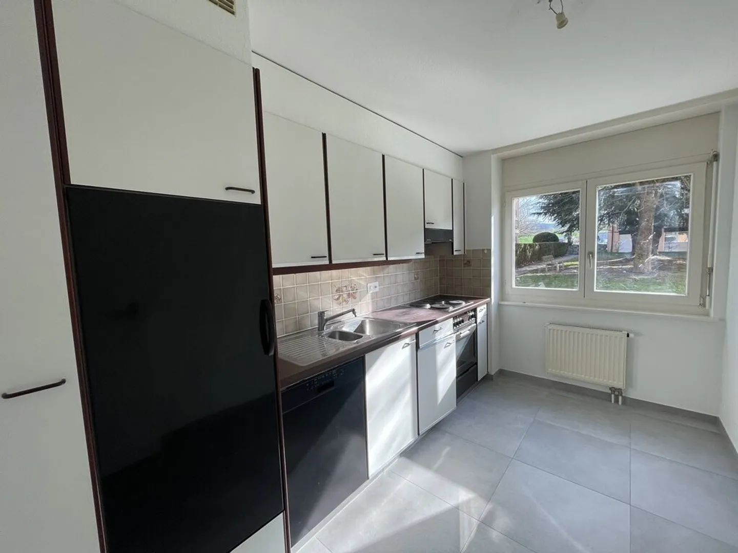 Charmant appartement 3.5 pièces - Photo 3 sur 4