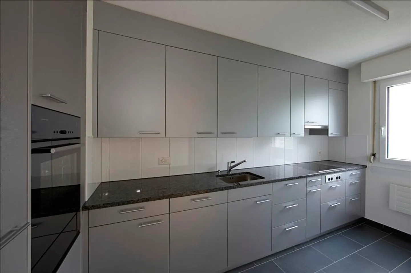 Moderne Wohnung mit Gartensitzplatz - Foto 2 von 4