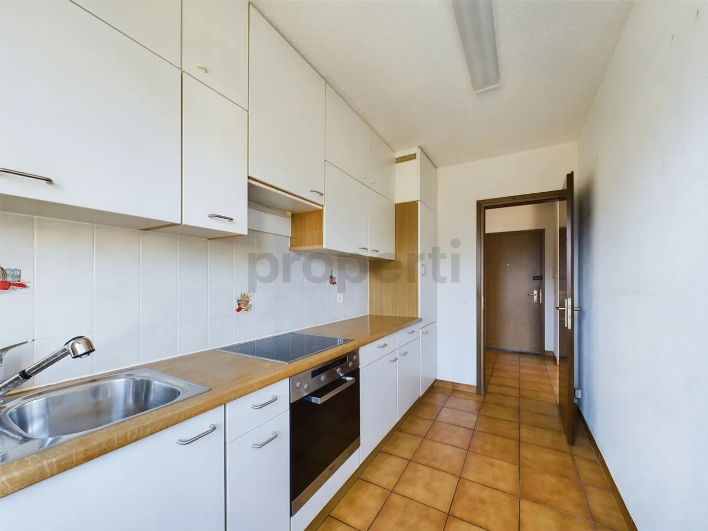 Incantevole appartamento di 3,5 locali a Caslano con balcone e garage - Foto 4 di 11