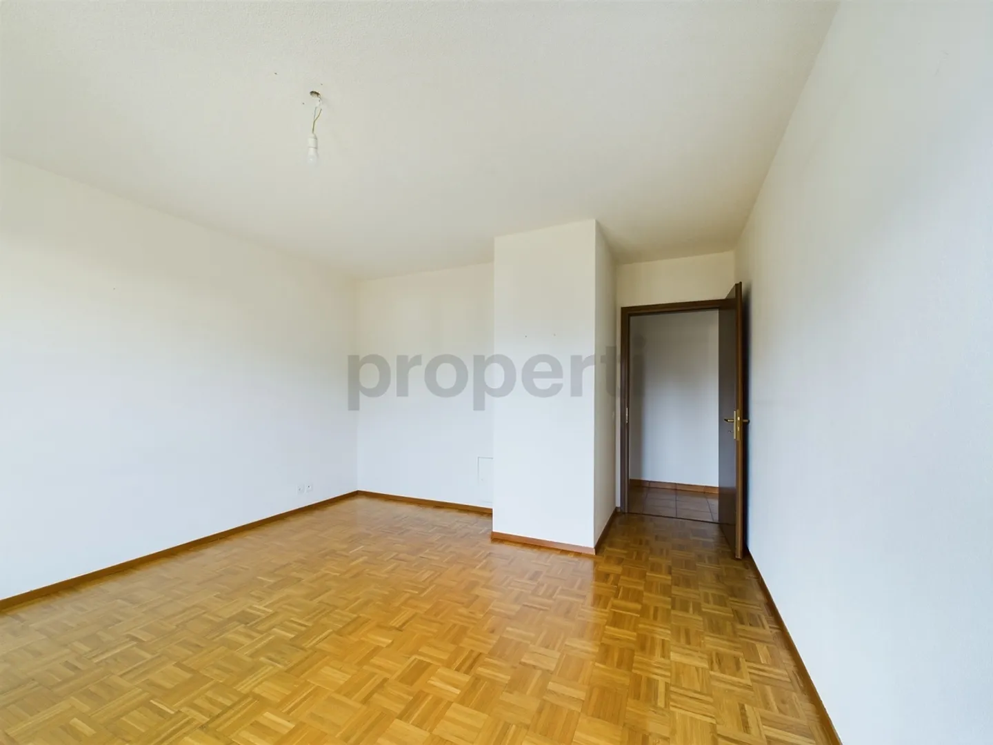 Incantevole appartamento di 3,5 locali a Caslano con balcone e garage - Foto 7 di 11
