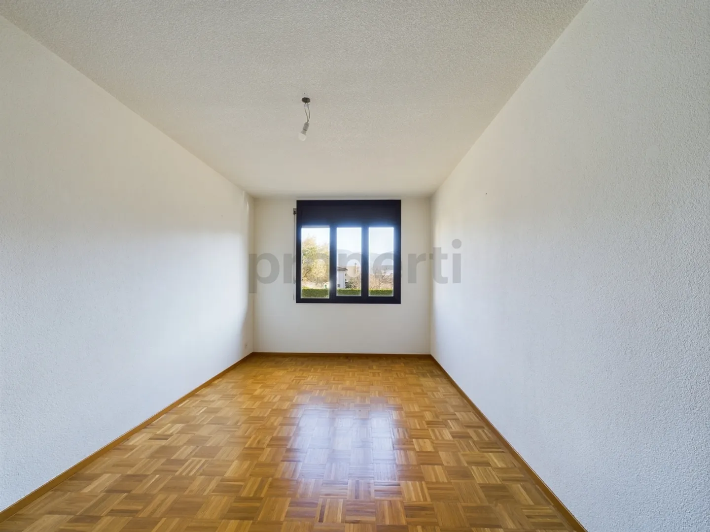 Incantevole appartamento di 3,5 locali a Caslano con balcone e garage - Foto 8 di 11
