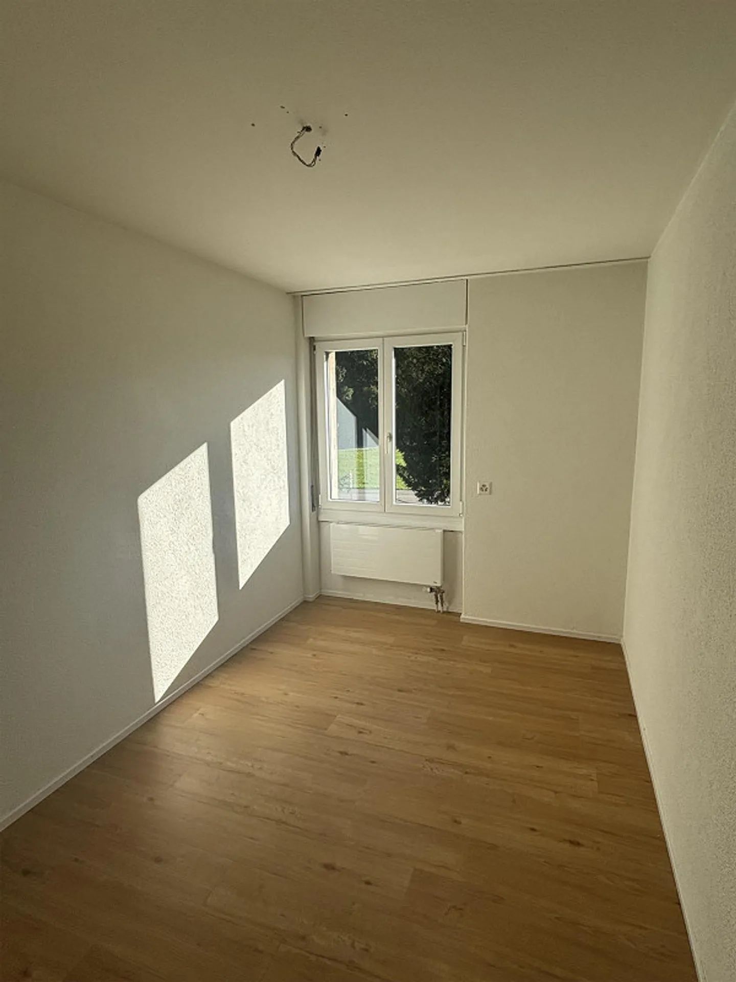Appartement lumineux de 4.5 pièces avec une belle vue sur la verdure - Photo 7 sur 12