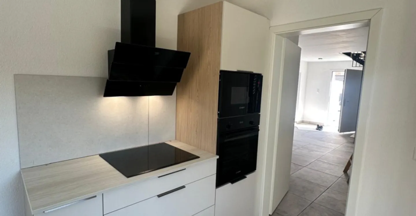 Spacious duplex of approx. 180 m² with terrace and two parking spaces in Corminboeuf - Photo 7 of 14