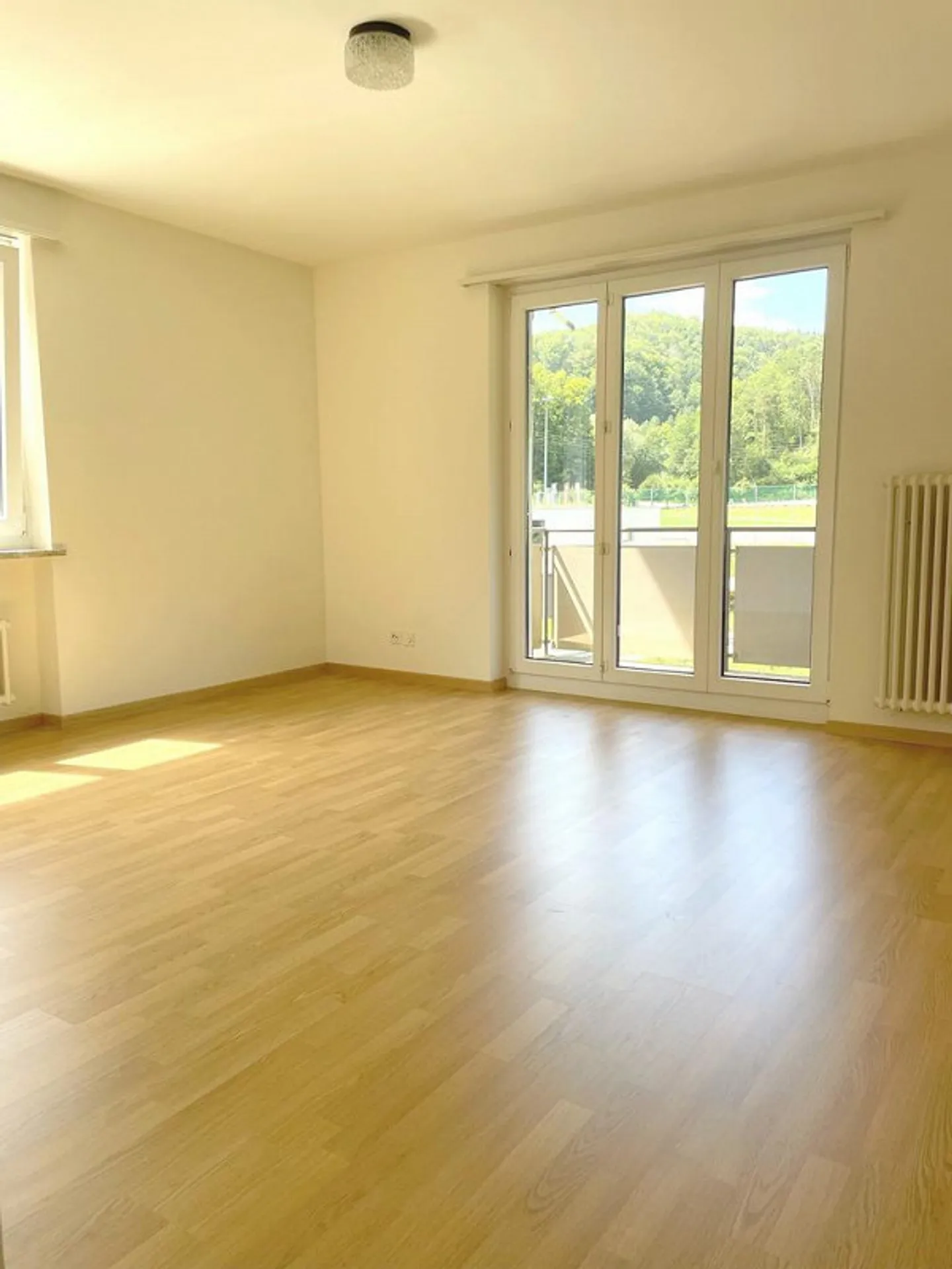 Appartamento in un ambiente verde con balcone - Foto 3 di 10