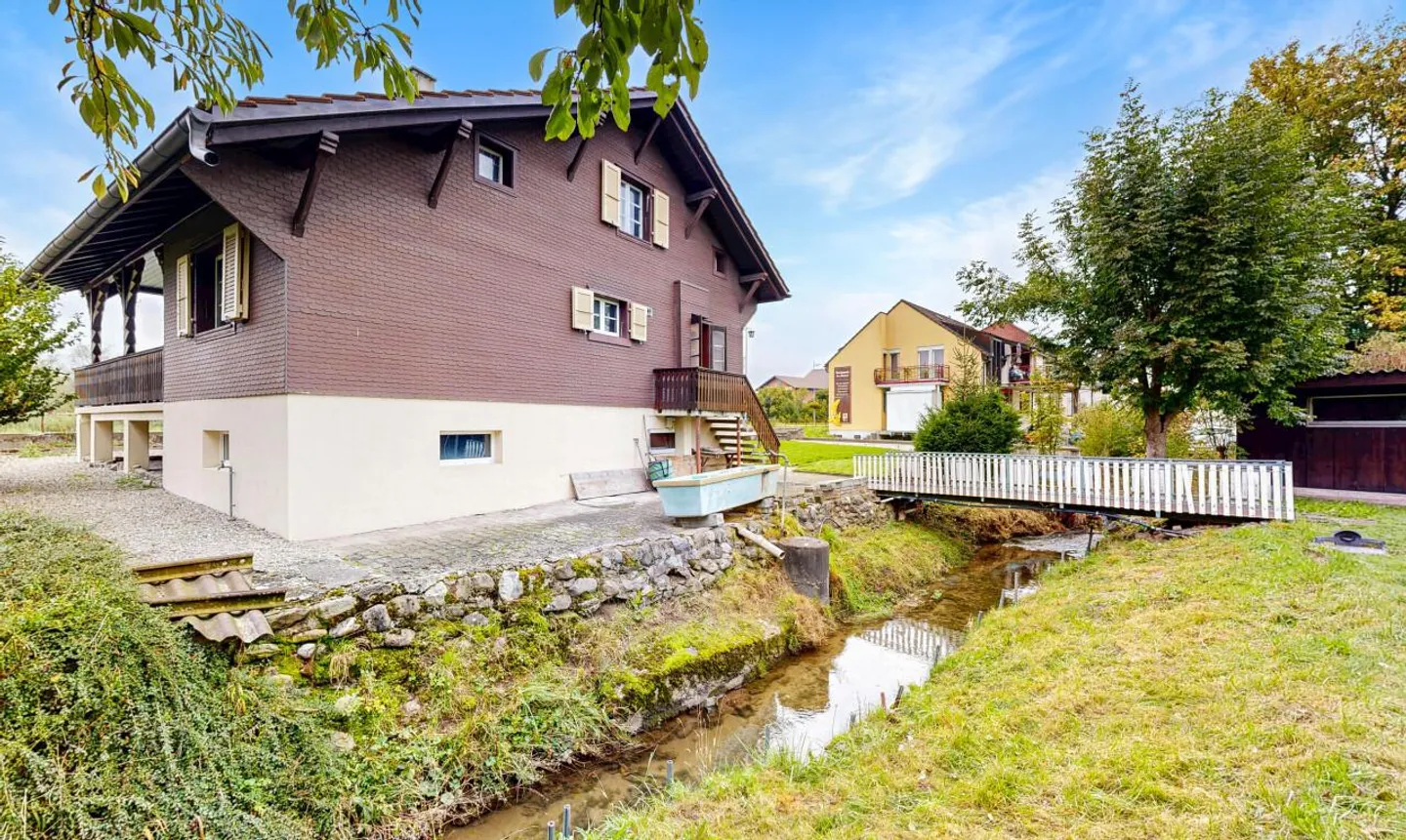 Charmantes Chalet mit großem Grundstück und schönem Potenzial - Foto 5 von 13