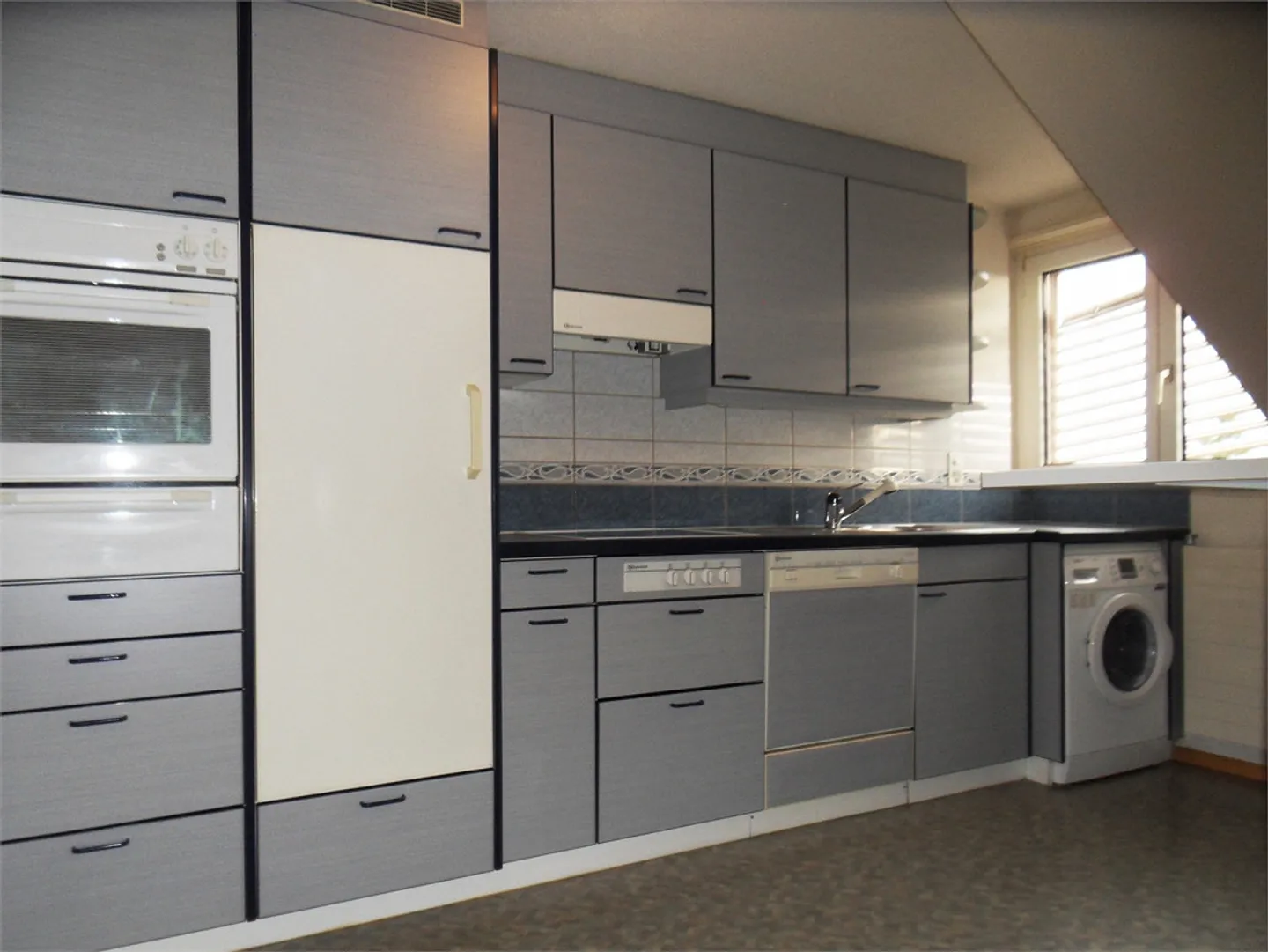 Charmante Dachwohnung - Foto 4 von 6