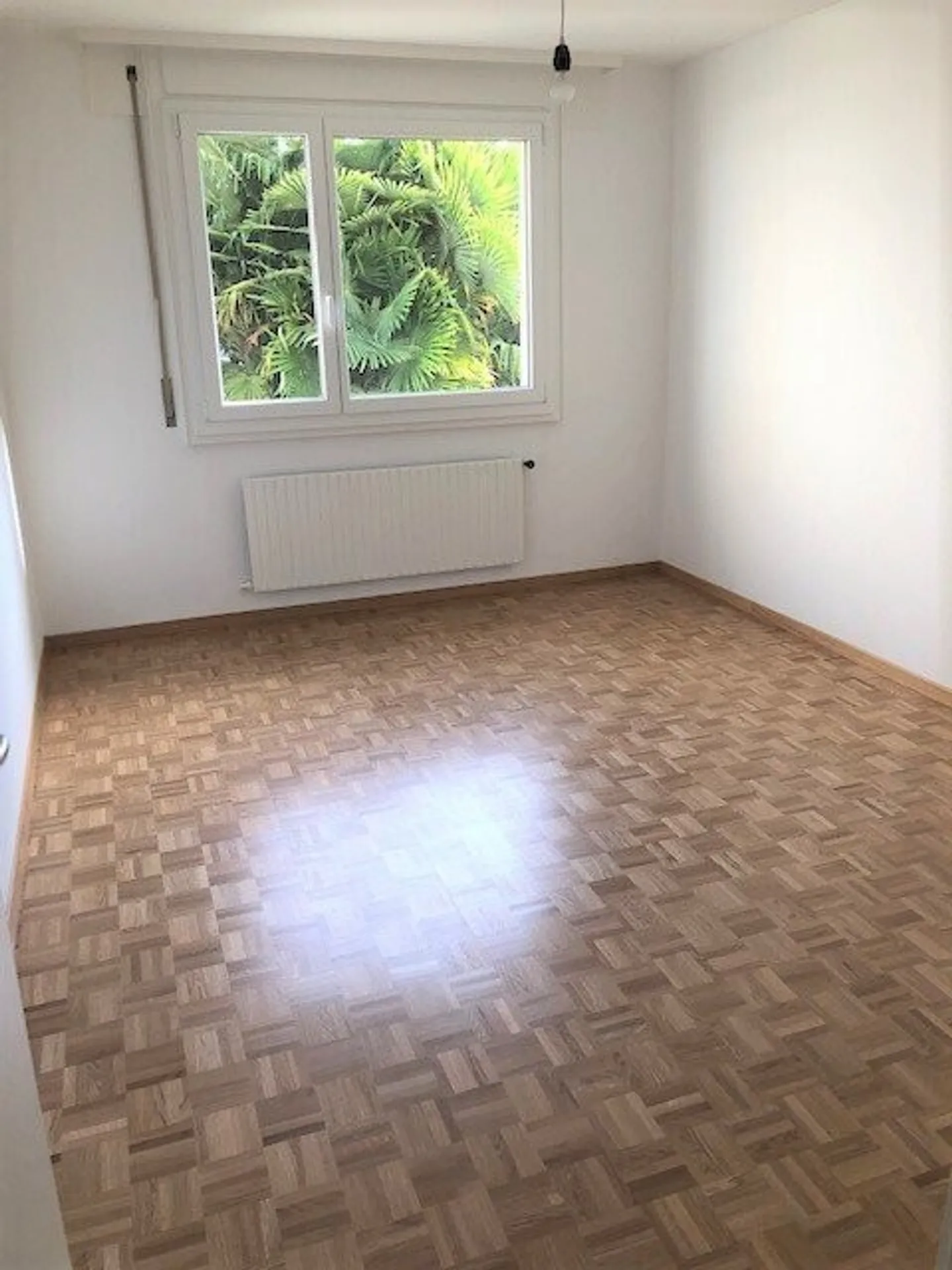 Appartement Charmant en Zone Verte - Photo 3 sur 5