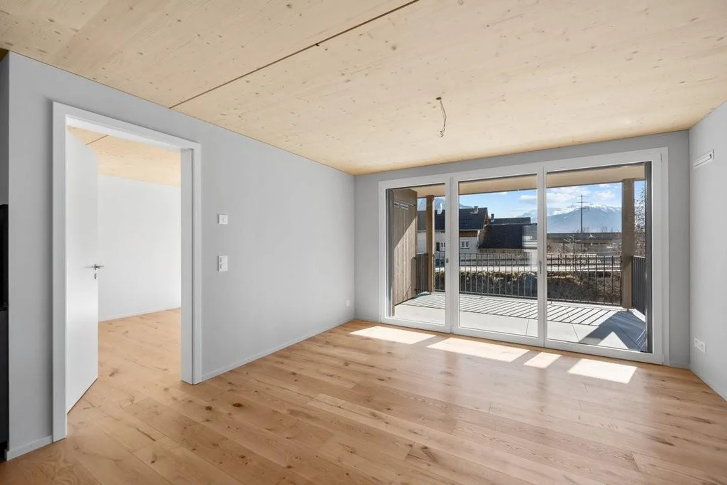 Première location - Appartement de 4,5 pièces en construction bois - Photo 2 sur 8