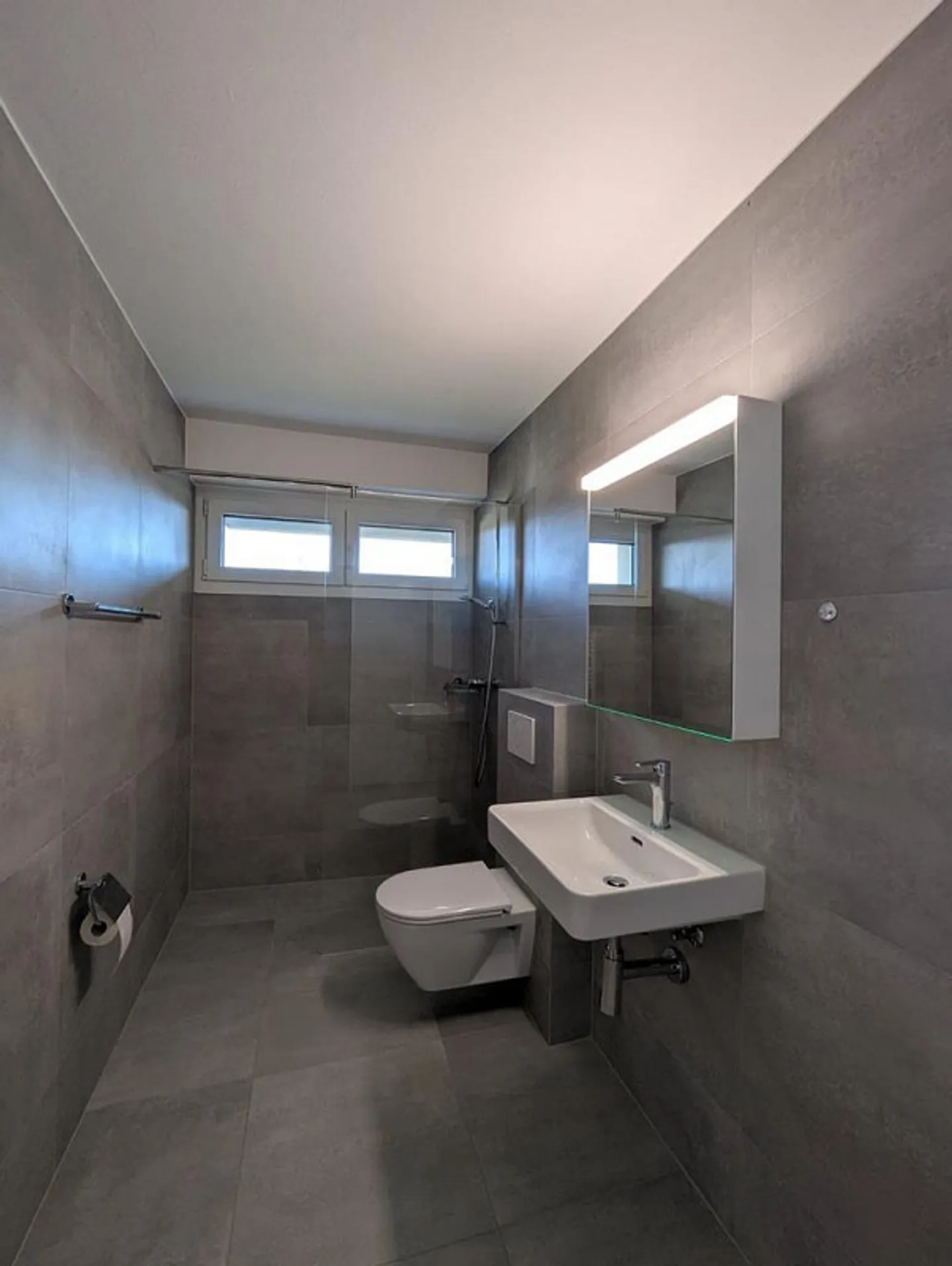 Modern 2.5-room apartment on the 1st basement floor with terrace - Photo 5 of 11