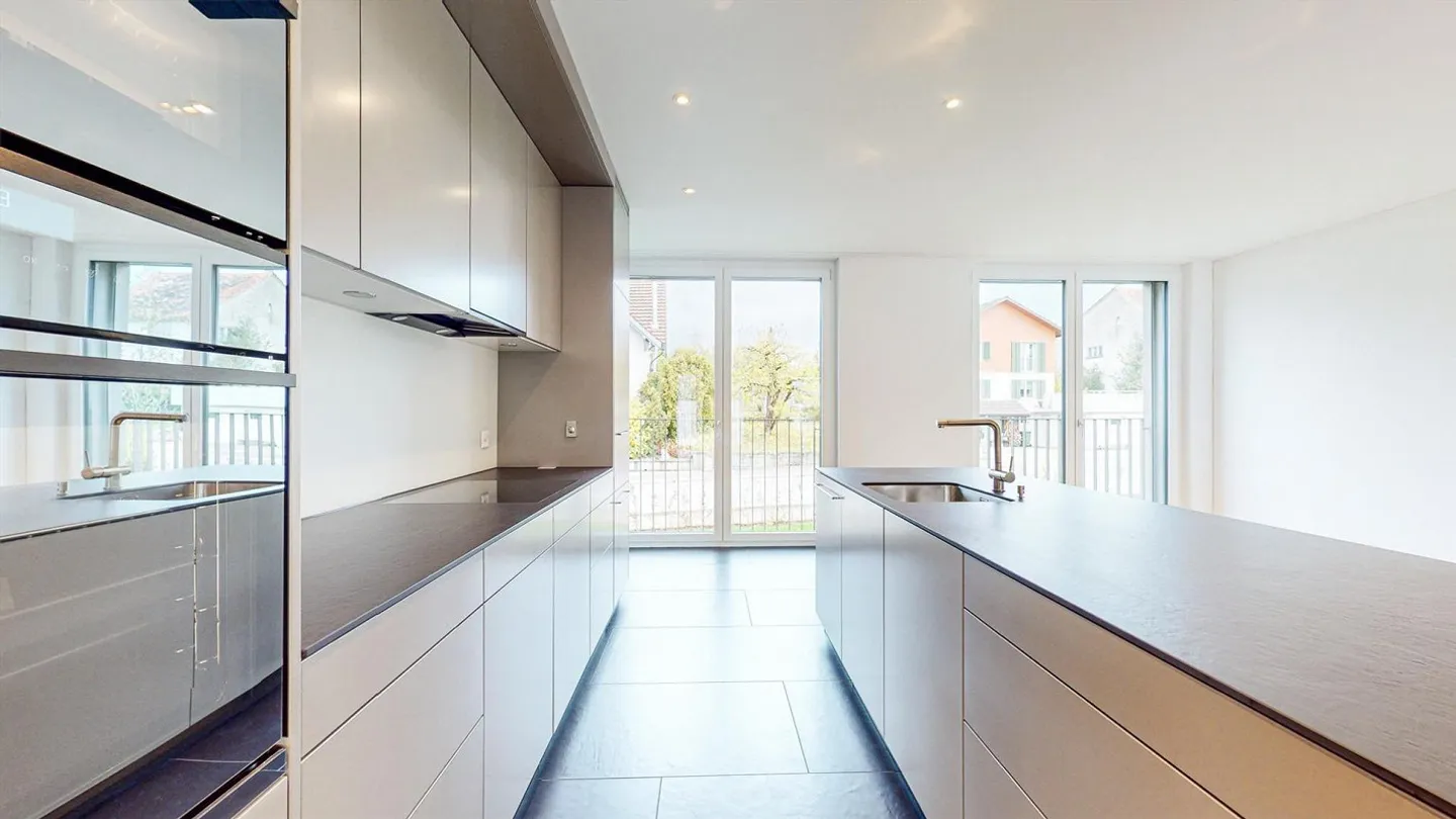 Moderne 4.5 Zimmerwohnung - Foto 2 von 10