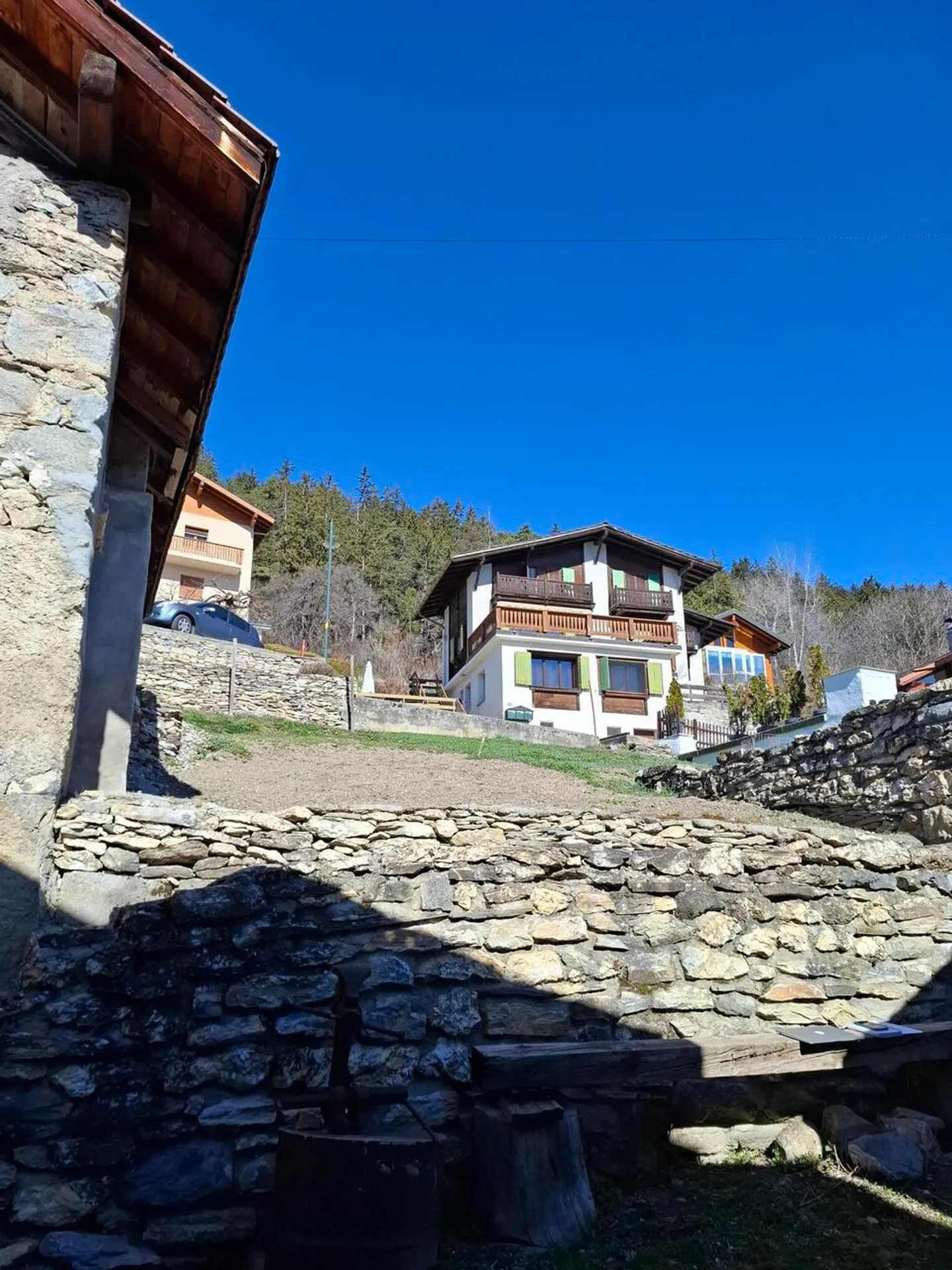 Terrain constructible avec garage et places de parc à Chermignon - Photo 3 sur 9