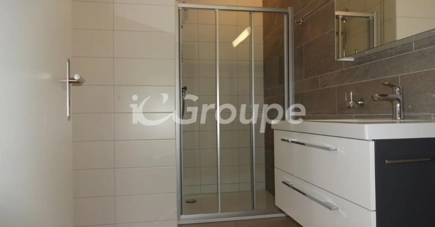 Appartement moderne au rez-de-chaussée - Photo 4 sur 13
