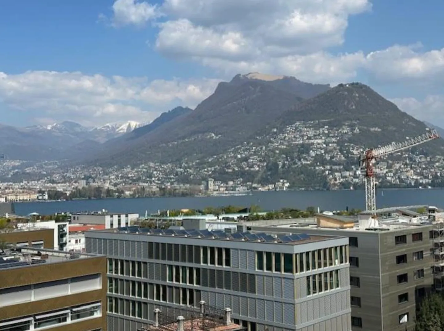 Magnifique appartement en attique avec piscine et vue sur le lac à Lugano - Photo 2 sur 10