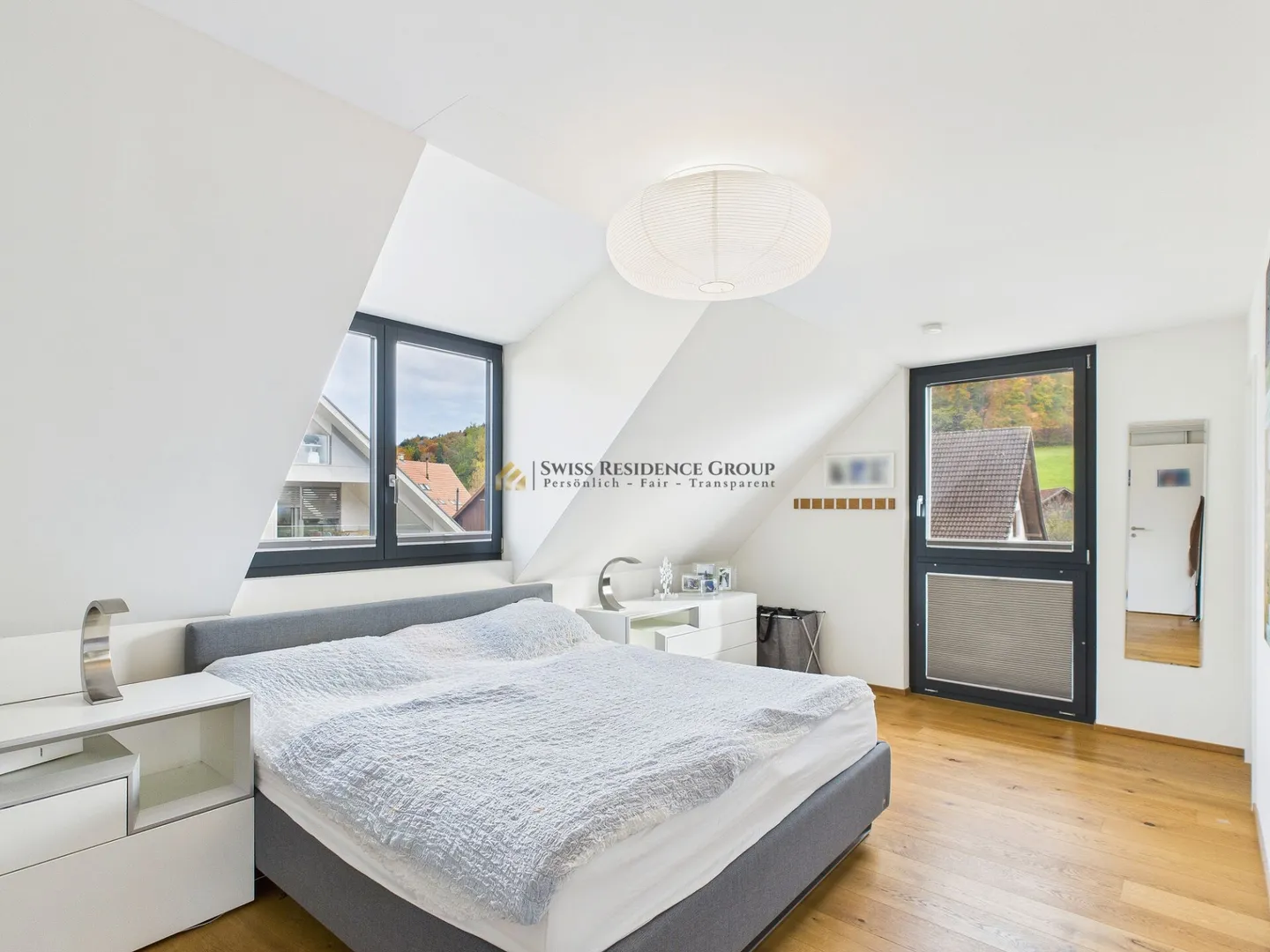 Family-friendly 4.5-room Minergie apartment with panoramic views, comfort, and attractive tax situation - Photo 10 of 16