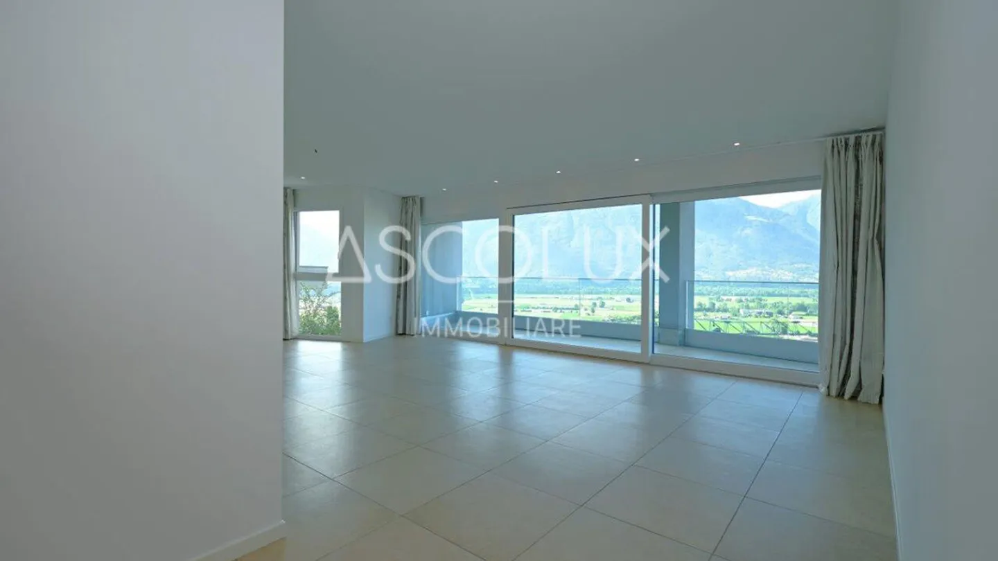 Appartement 3.5 pièces avec terrasse couverte, vue panoramique et lac - Photo 5 sur 13