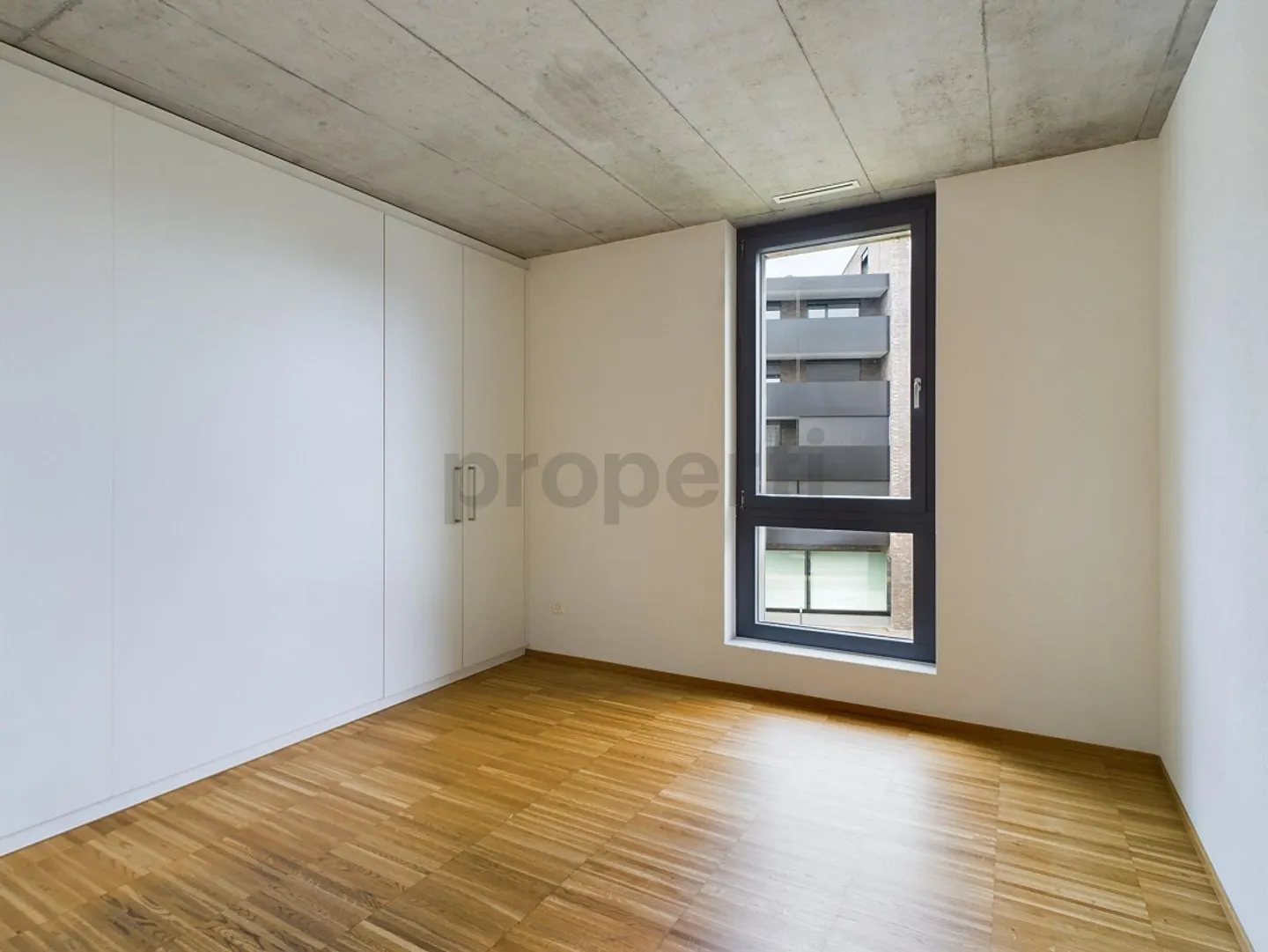 Covered terrace and Minergie comfort, own washing tower and parking... - Photo 11 of 17