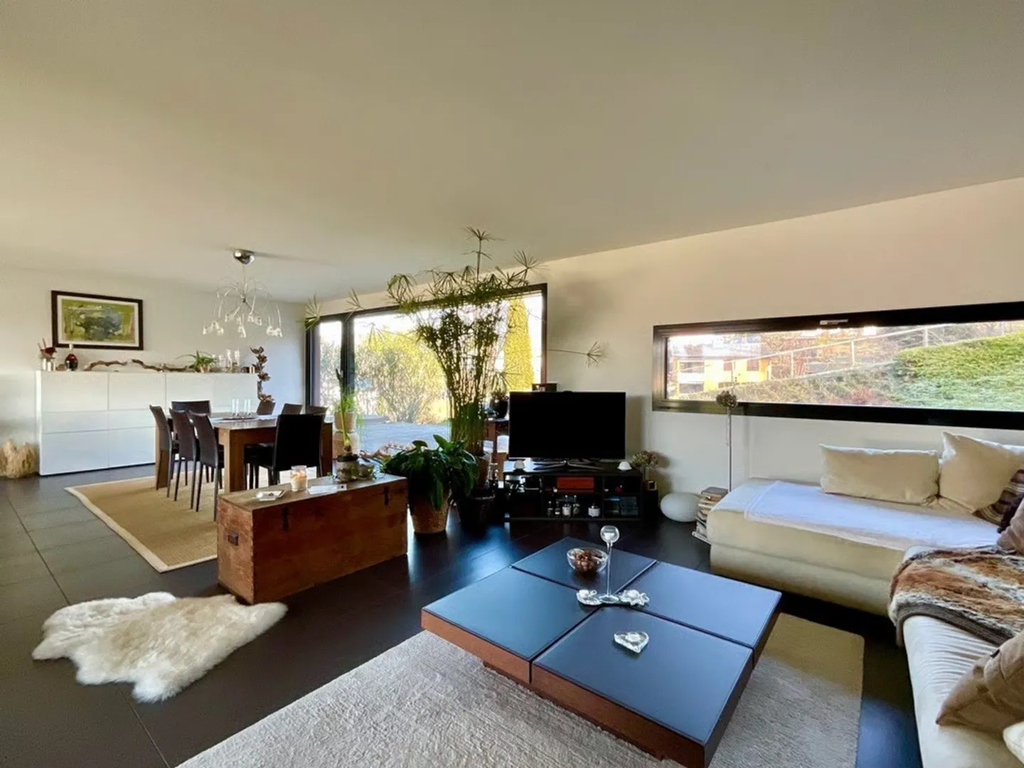 DAVESCO - UN MAGNIFIQUE APPARTEMENT DE 4.5 PIÈCES AVEC JARDIN - Photo 4 sur 13