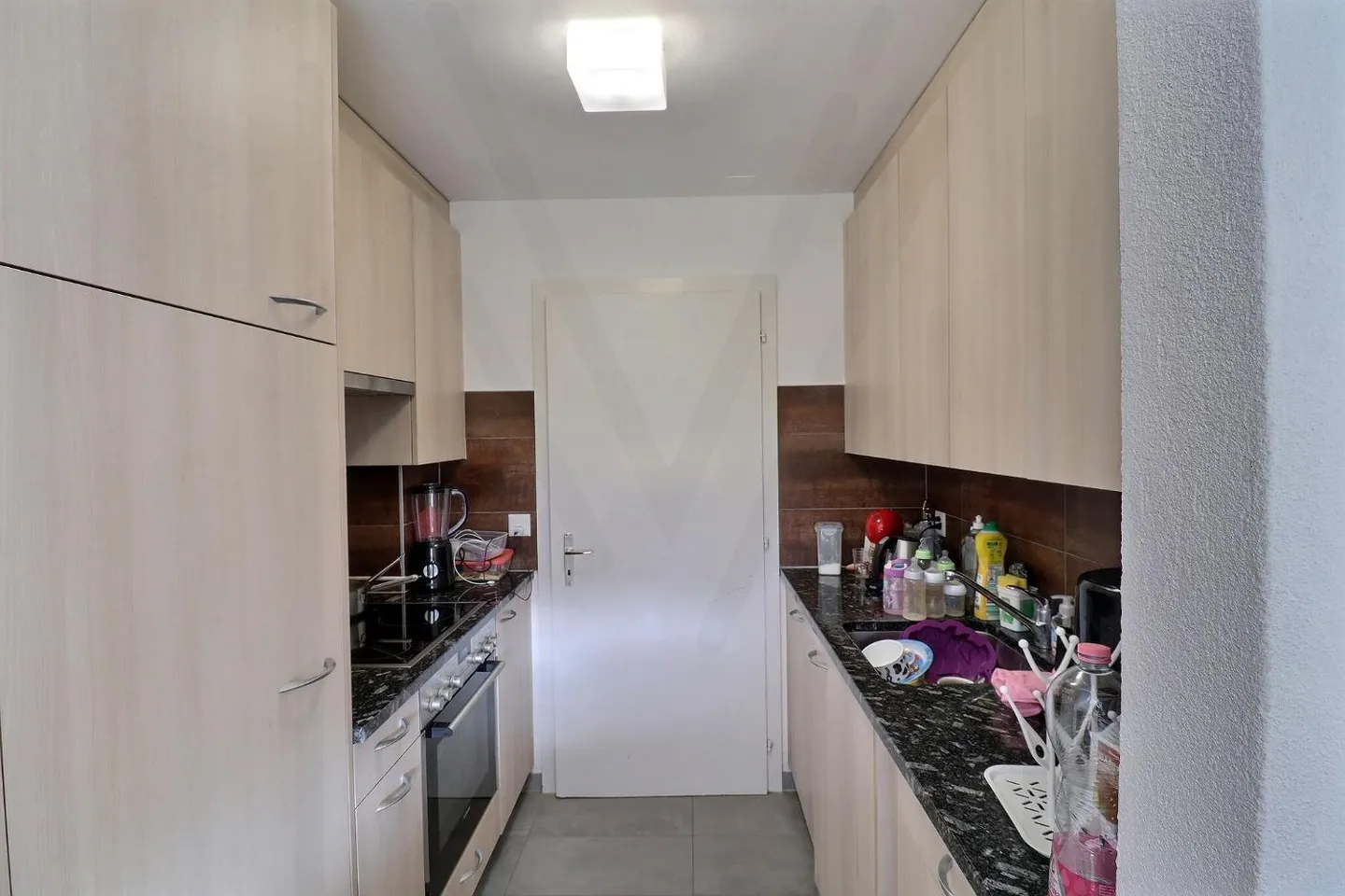 Bright 3.5-room apartment in the heart of the village? Ideal location between Bulle - Photo 3 of 10