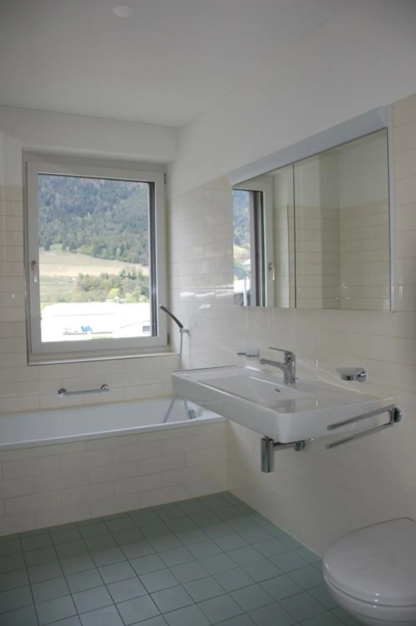 Appartement moderne avec un agencement généreux - Photo 4 sur 8