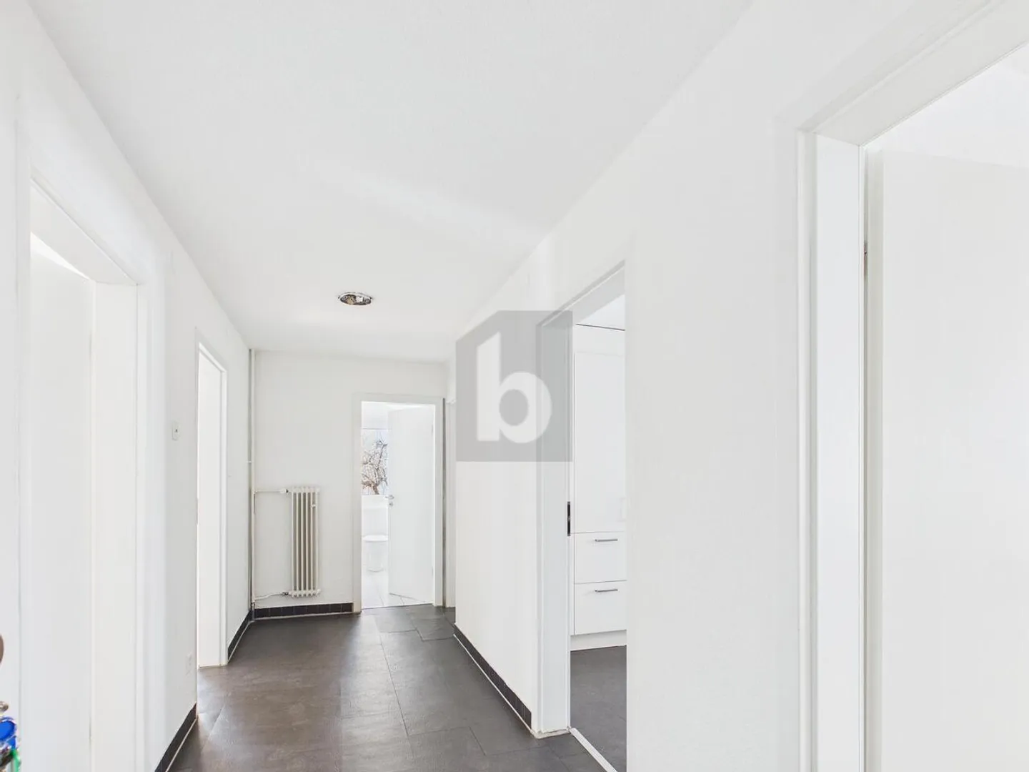 RENOVATED, SUNNY AND CENTRAL - Photo 3 of 6