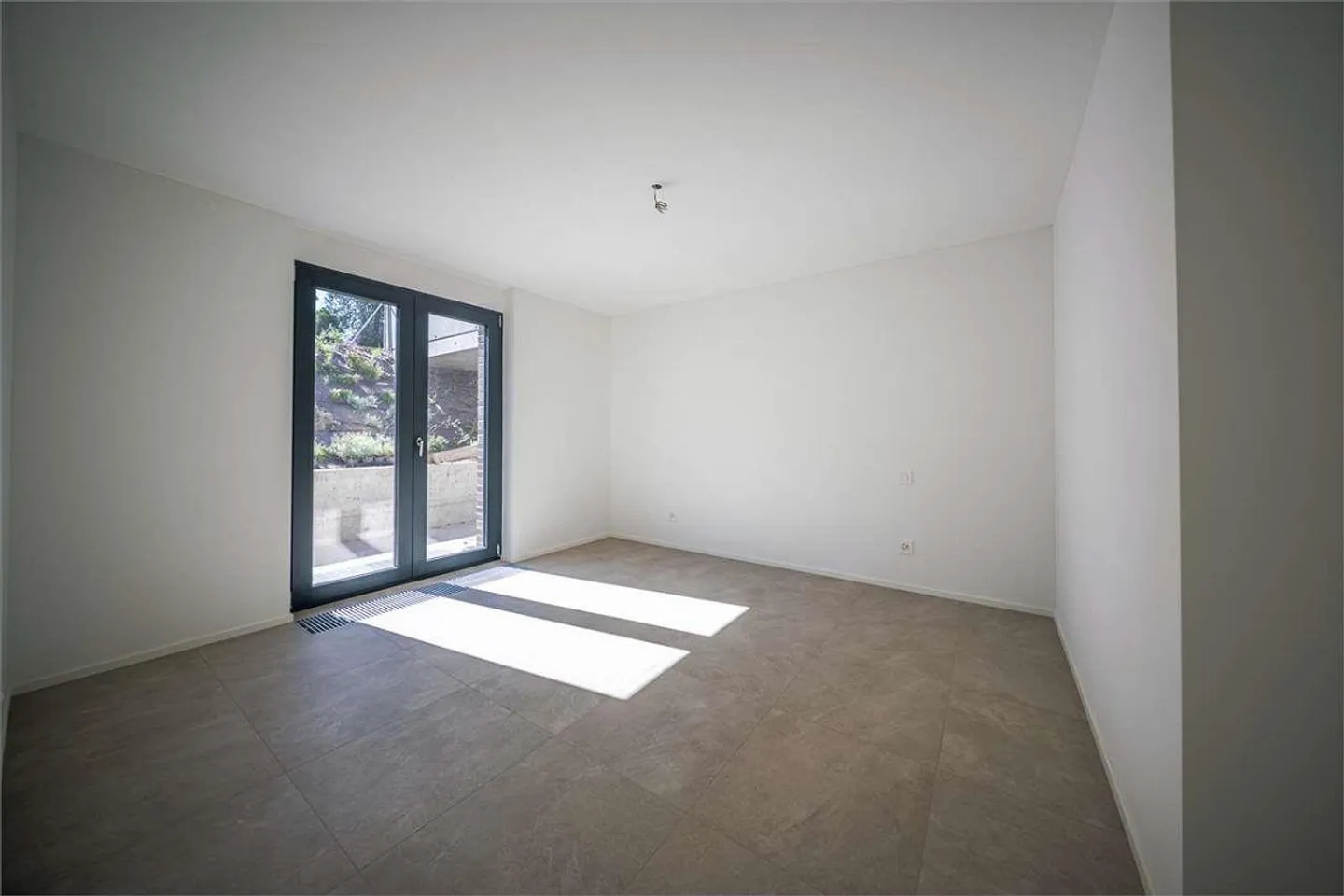 Elegantes 3,5-Zimmer-Apartment in Bioggio - Foto 9 von 13