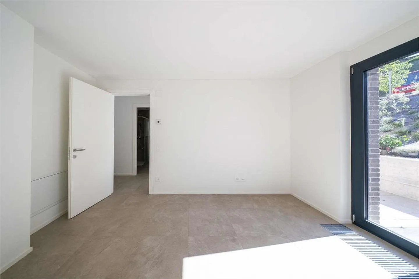 Elegantes 3,5-Zimmer-Apartment in Bioggio - Foto 10 von 13