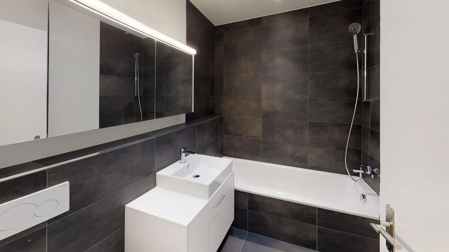 Ottimo appartamento attico di 3,5 locali con splendida vista sul lago - Foto 6 di 9