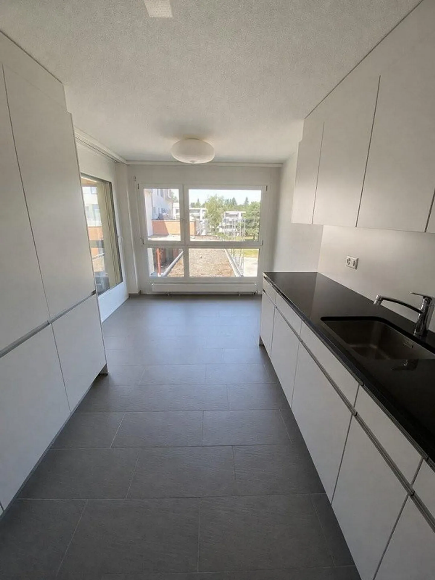 Family-friendly and modern in the center of Schliern - Photo 1 of 10