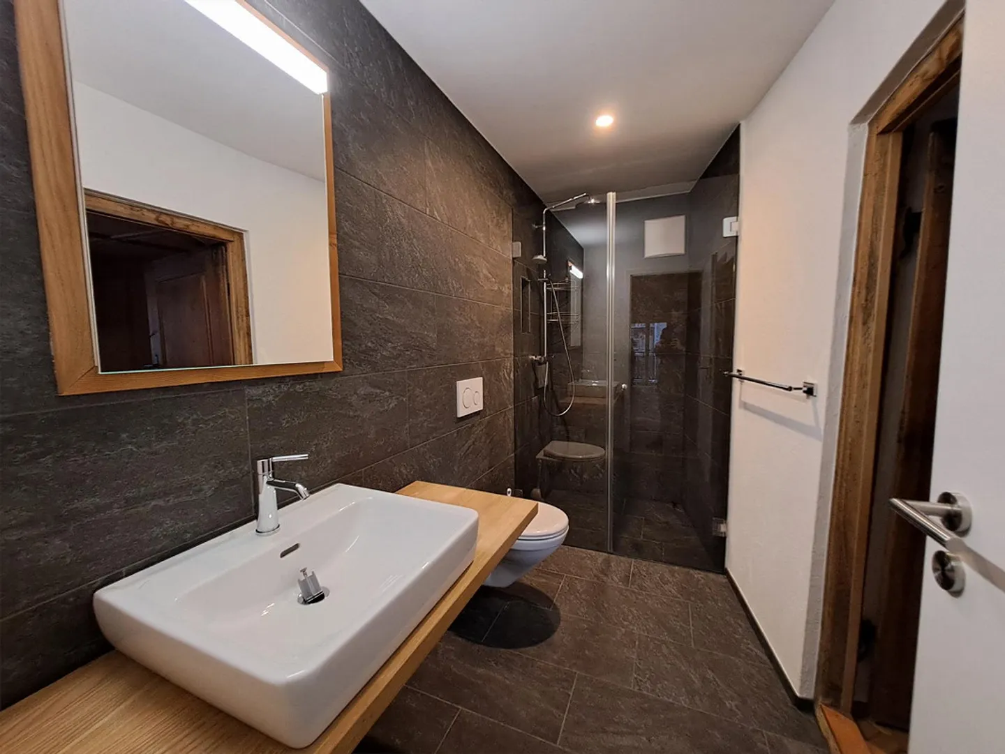 Appartement douillet avec poêle en faïence - Photo 8 sur 13