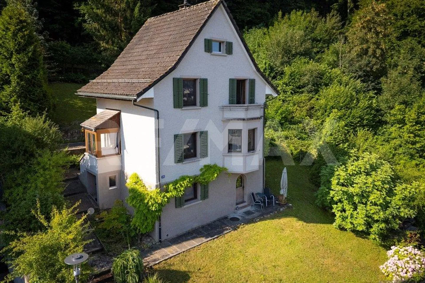 Vivere con vista – Incantevole casa degli anni '30 con appartamento nel verde Kappelerhof - Foto 1 di 13